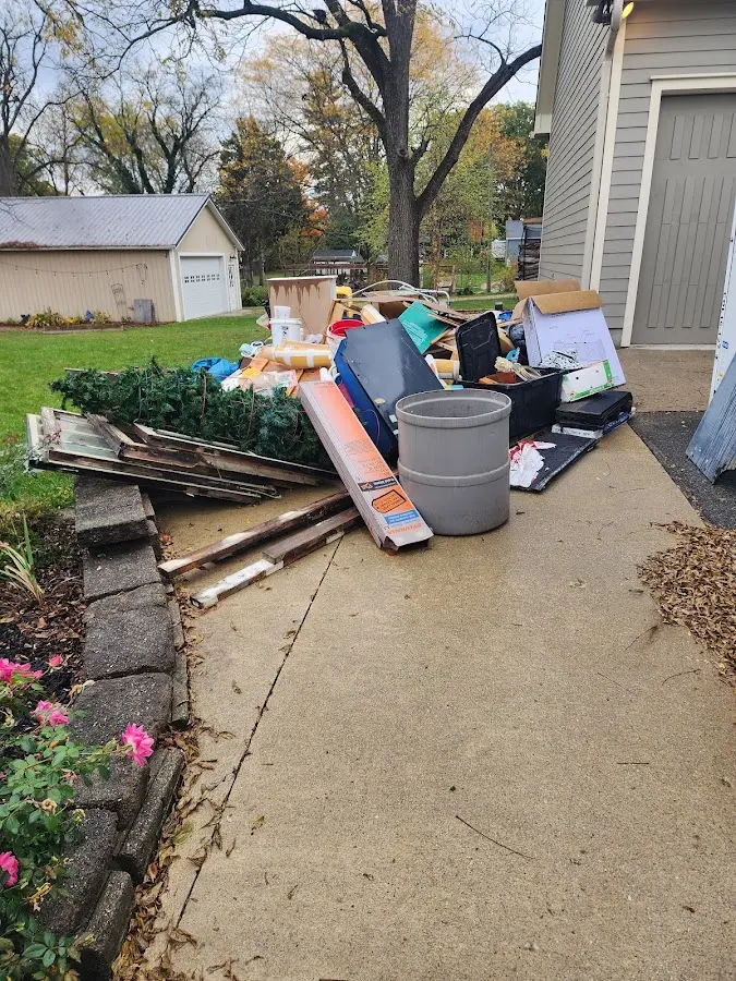 Dumpster being loaded with debris for Demolition Dumpster Rental in Parkesburg